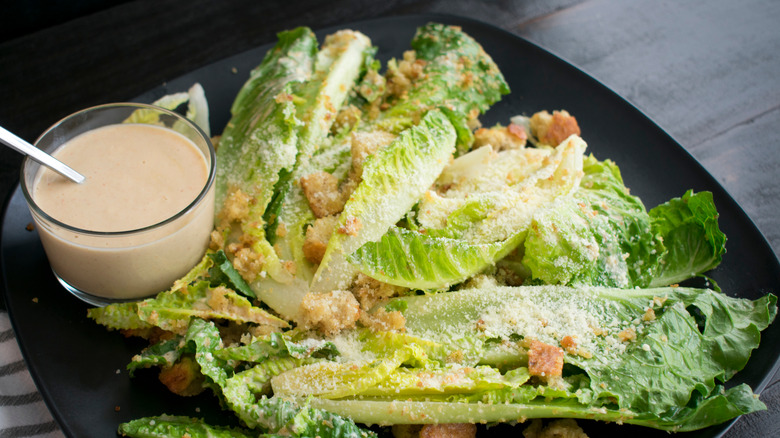 Caesar salad with long hearts of Romaine