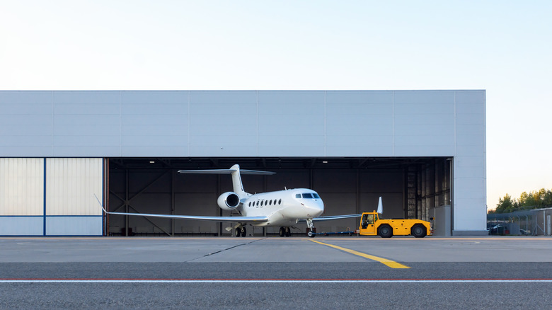 A plane in an airplane hangar
