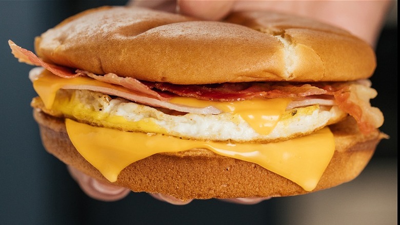 Person holding Breakfast Jack sandwich