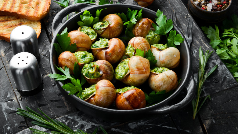 Escargot de Bourgogne in cast iron skillet