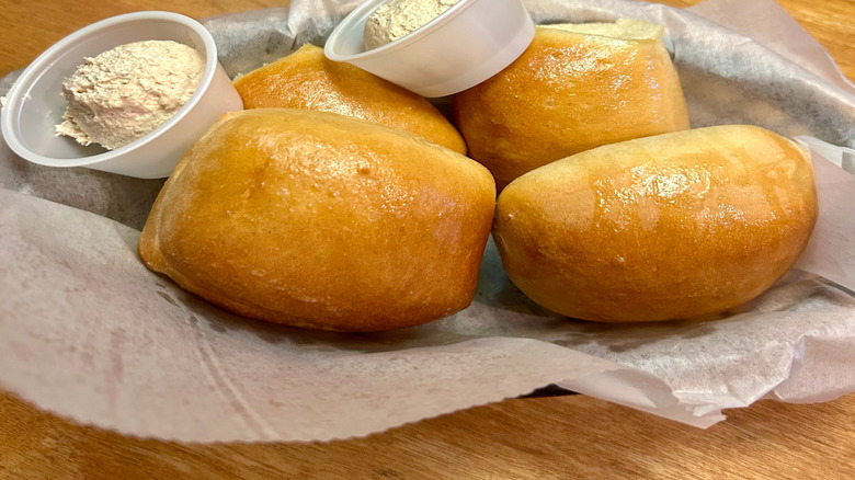 Close up of Texas Roadhouse rolls and butter