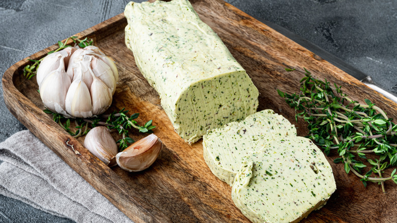 Compound garlic butter on a board