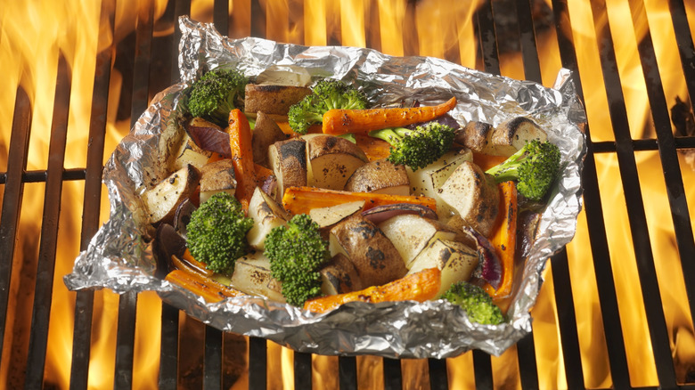 Vegetables in foil on grill