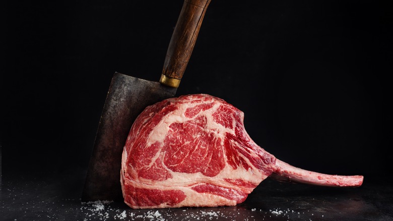 Raw tomahawk steak chopped