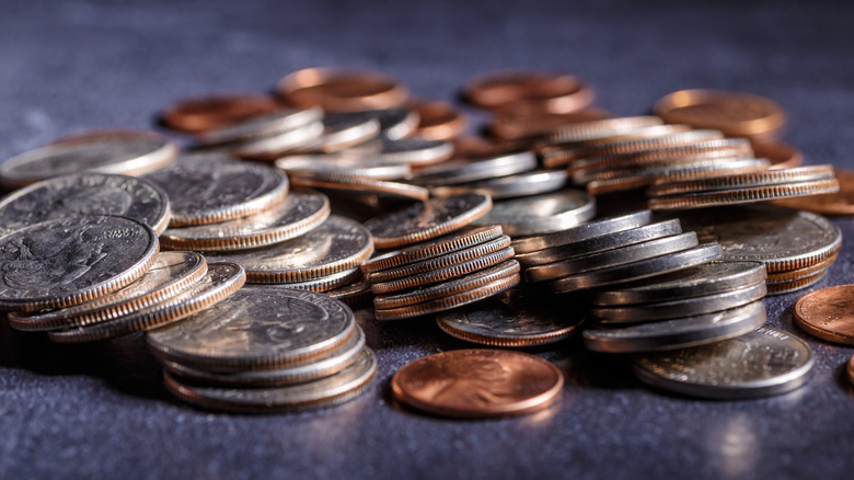 Pile of quarters and pennies