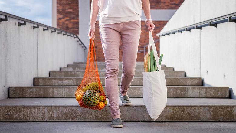 woman with reusable bag