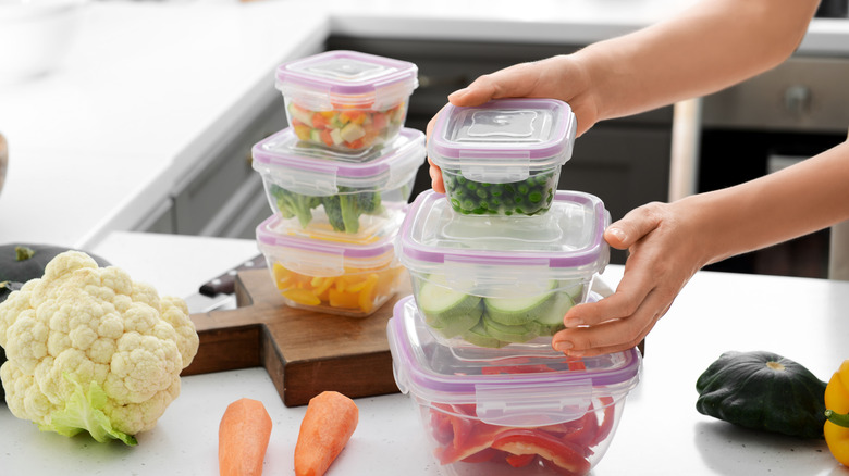 Food storage containers stacked on a countertop