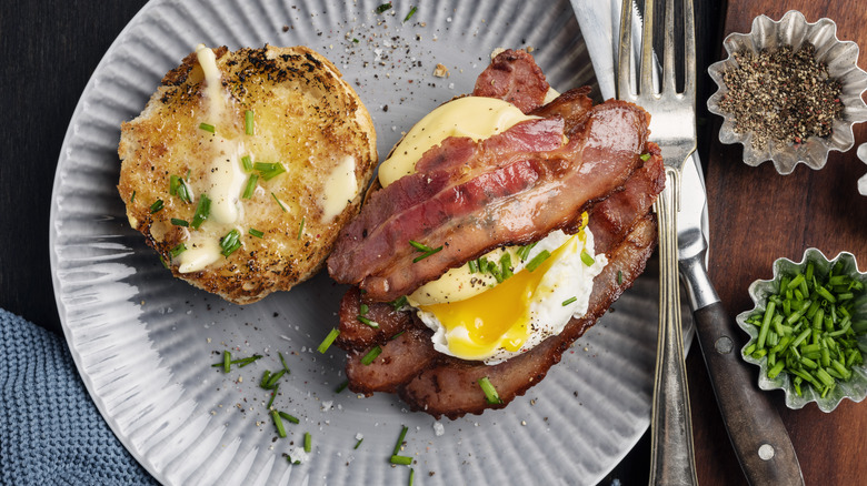 Poached egg bacon sandwich open