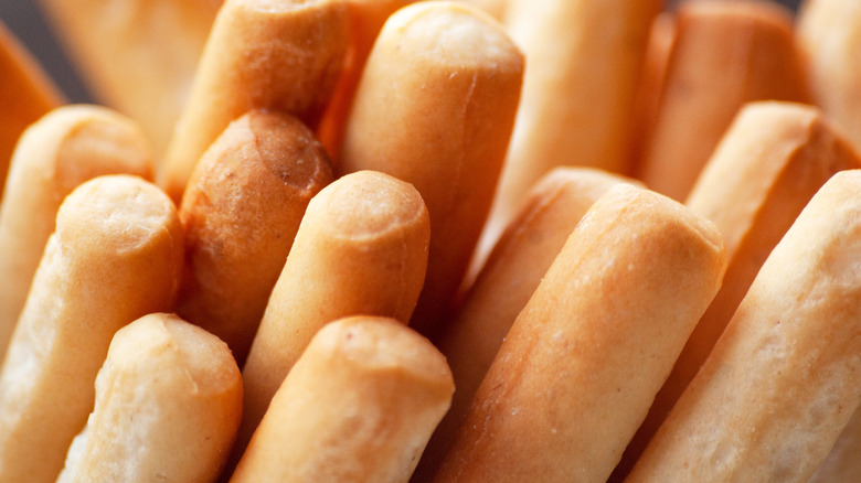 Closeup on breadsticks stacked together vertically
