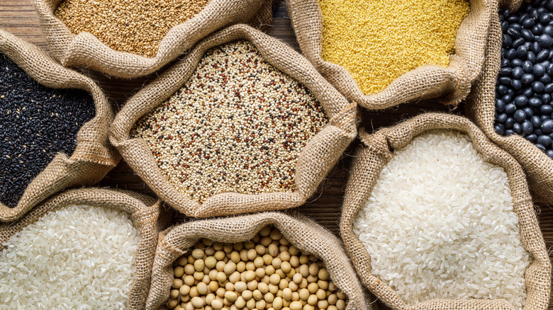 variety of grains in burlap sacks