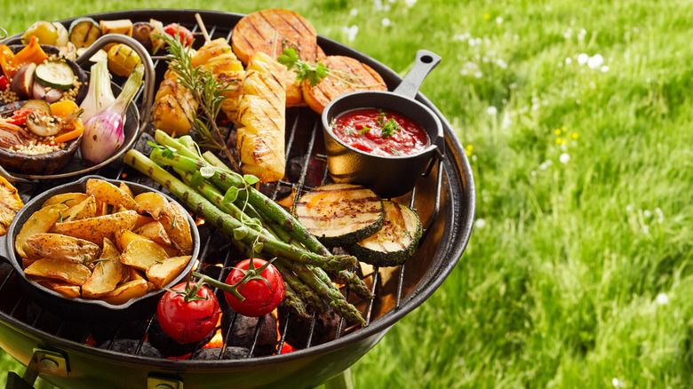 A grill piled with veggies