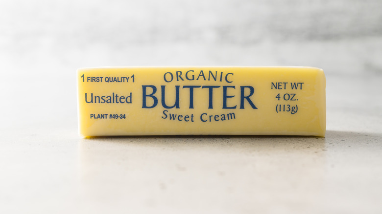 Stick of unsalted butter in a clear wrapper