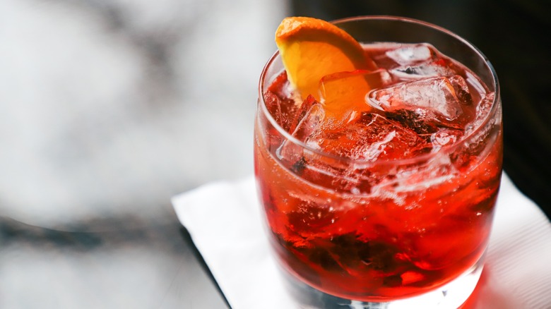 Negroni with orange in a glass