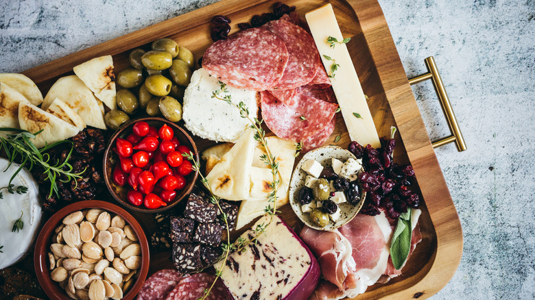 Charcuterie board on countertop 