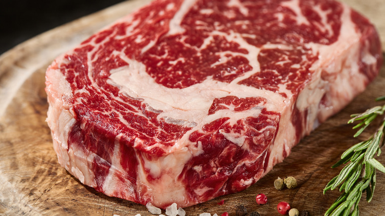 raw ribeye ready to grill