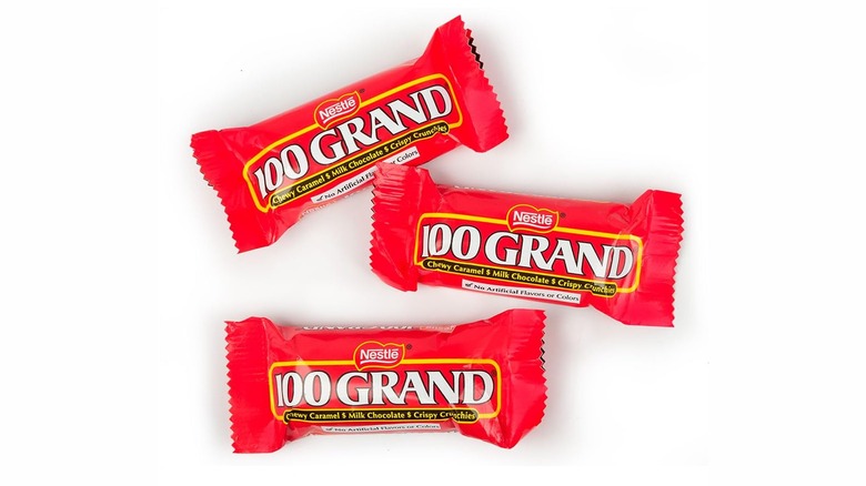Three 100 Grand mini bars on white background