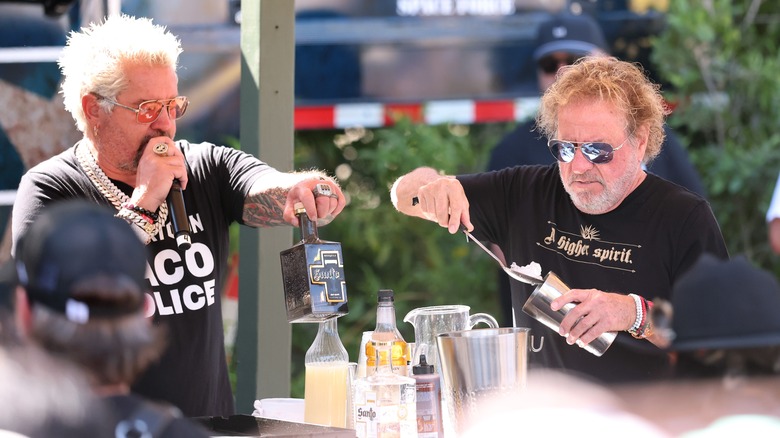 Guy Fieri mixing drinks