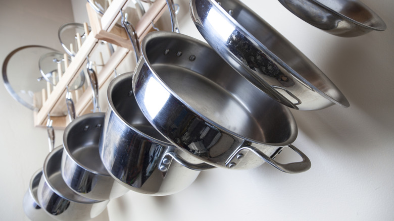 Pots and pans hanging on wall