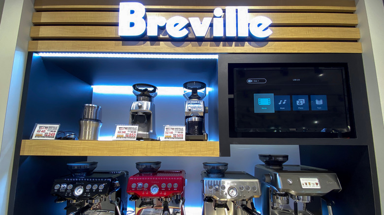 Breville espresso machines and grinders on display
