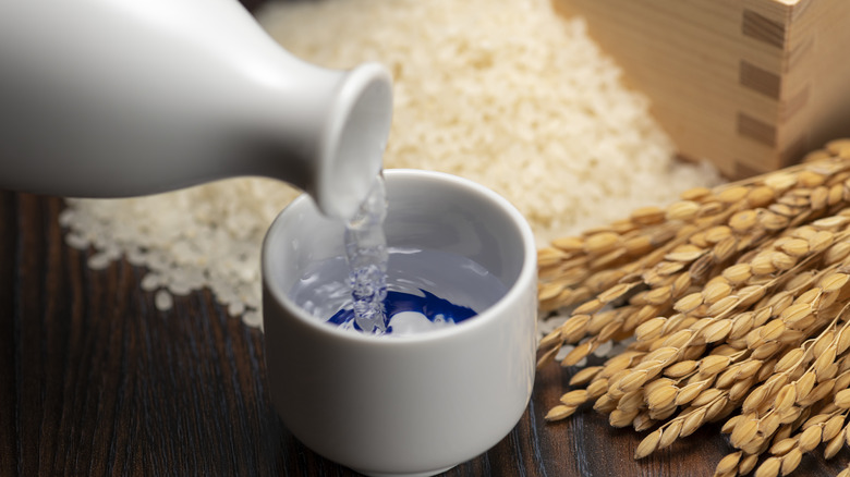 Sake pouring into a cup