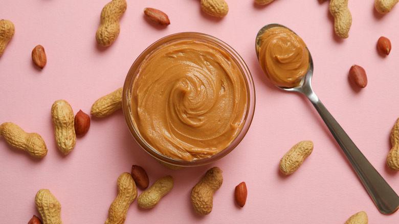 peanut butter against a pink background