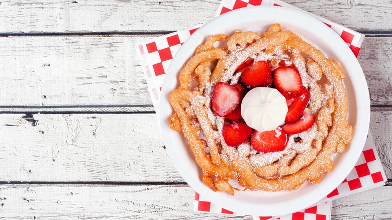 Funnel cake on wood background