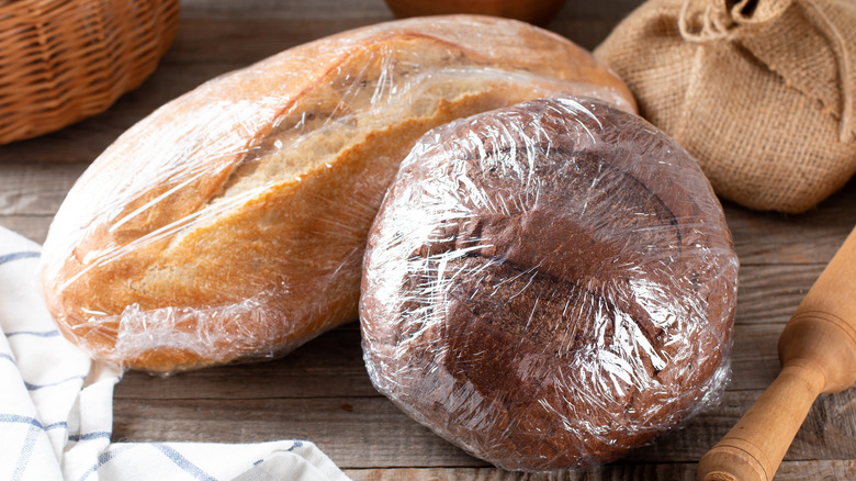 Bread loaves wrapped in plastic 