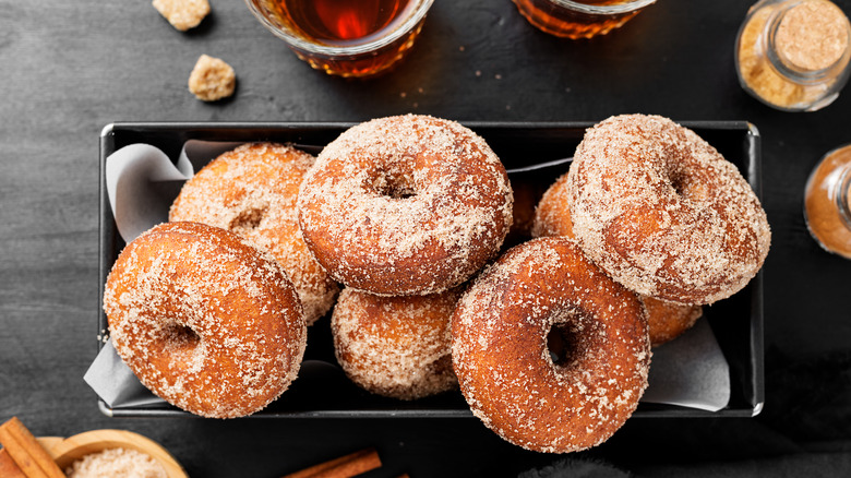 Homemade donuts in a black box