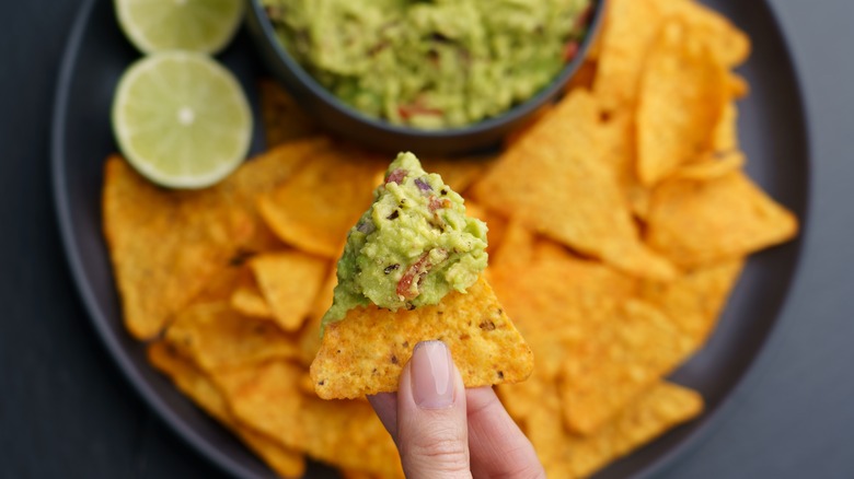Nachos and guacamole dip