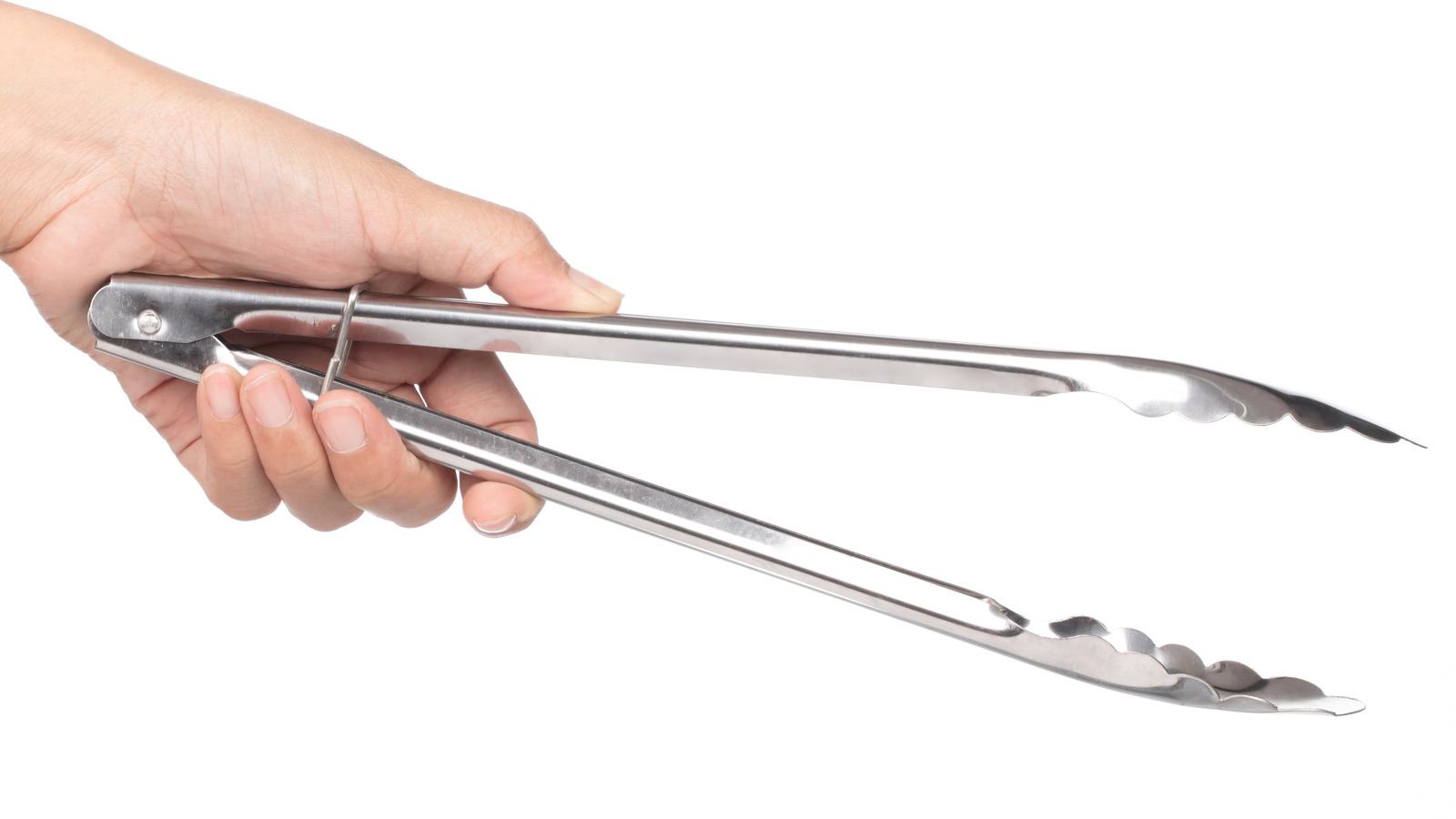 The Kitchen Tongs Hack That Will Make Juicing A Breeze