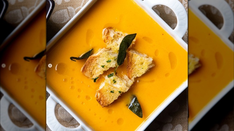 A photo of the outside of Press Cafe at Clearfork with fairy lights and a patio