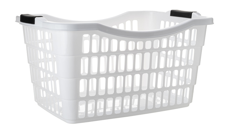 Empty plastic laundry basket
