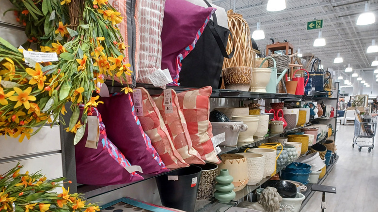 Shelves at HomeGoods stocked with decor products