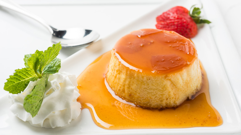flan by cream and strawberry