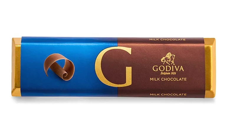 A Godiva milk chocolate bar isolated on a white background