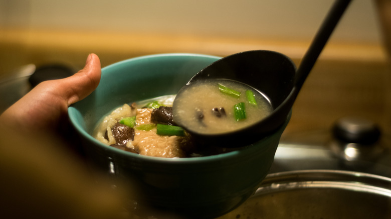 Serving home made miso soup 