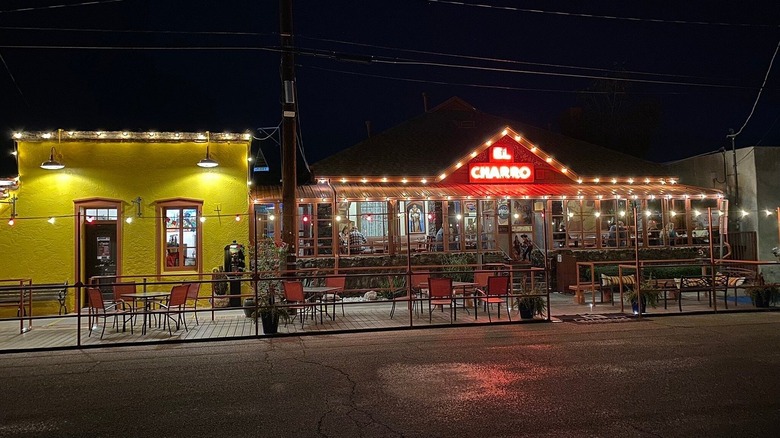 Lit exterior of El Charro Café at night