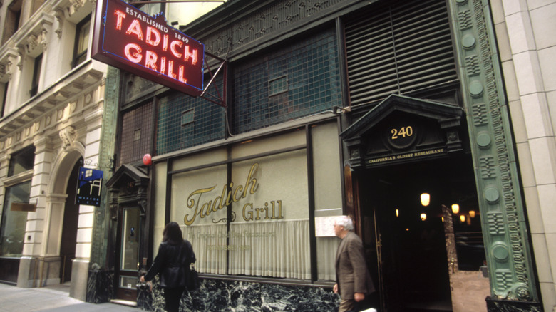 Exterior of Tadich Grill with a neon sign