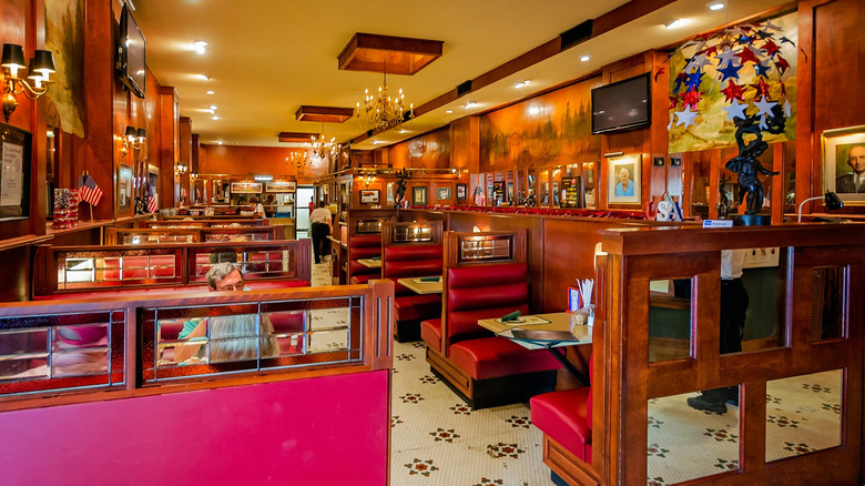 Interior of The Bright Star restaurant, with wood-paneled booths