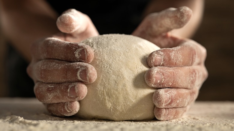 Someone making dough