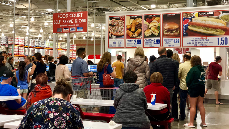 customers wait in line at Costco food court