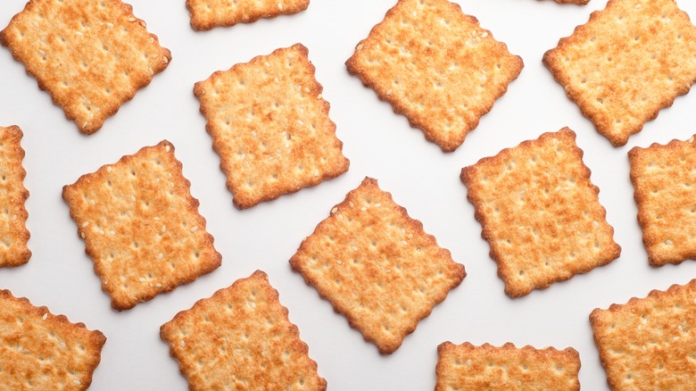 Cracker pieces on white background