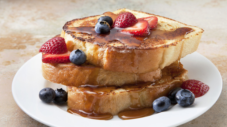 French toast with syrup and fruit