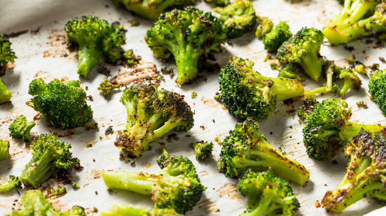 Roasted broccoli on baking sheet