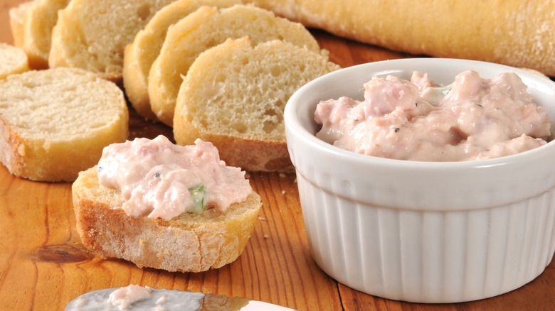 Deviled ham spread on slices of baguette