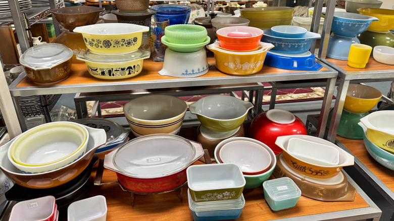 Multiple Pyrex dishes on shelf display