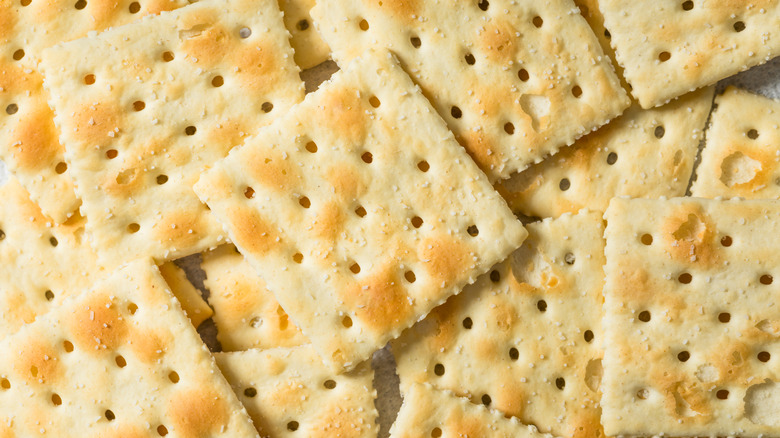 Close-up on a pile of Saltine crackers