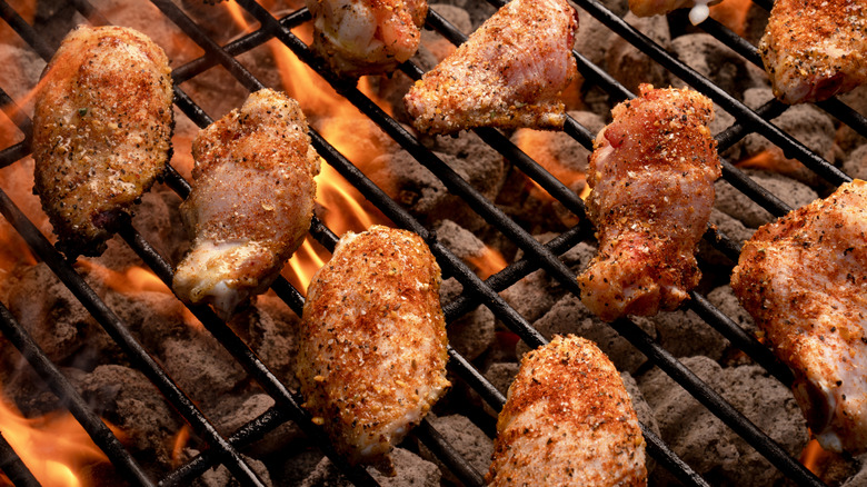 Chicken cooking on a grill