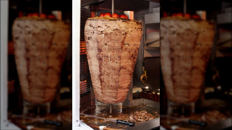 Sliced shawarma on vertical rotisserie