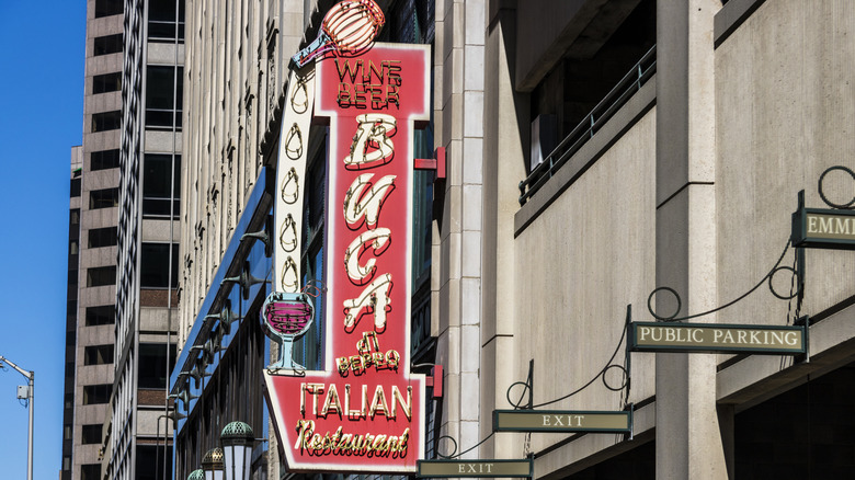 exterior signage of a buca di beppo in a downtown urban environment